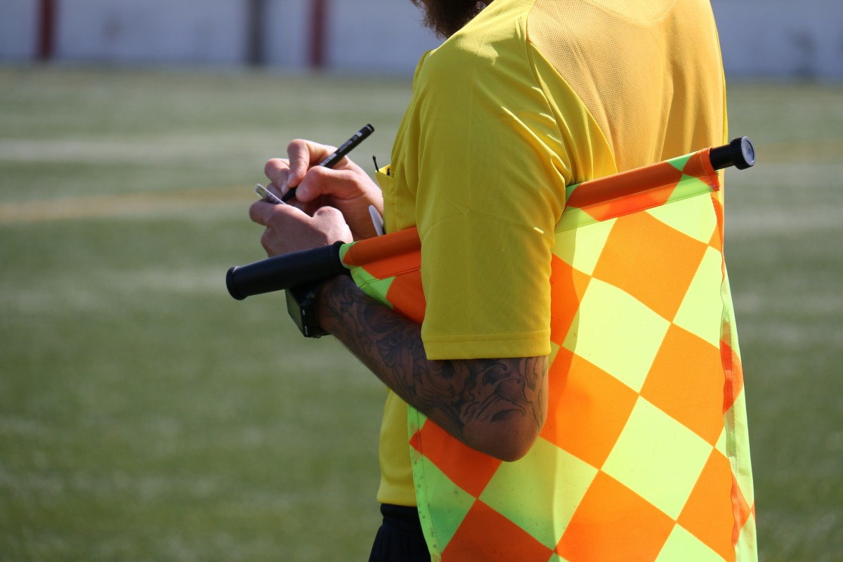 Yellow yellow card lineman referee lack football football game football field 1381826
