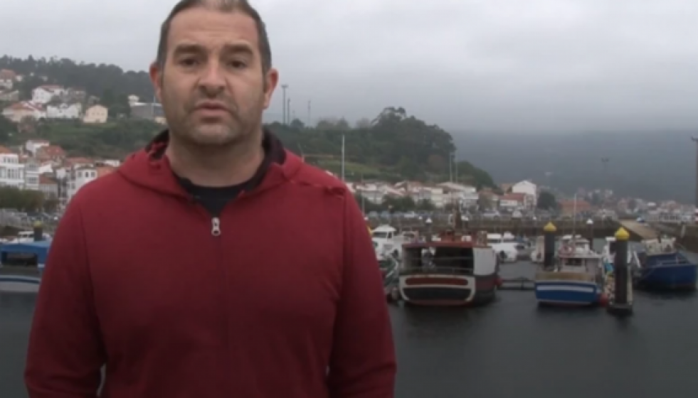 MarineroenelpuertodeMurosenunafotodeFrescoydelMar