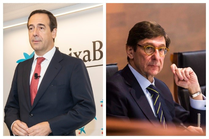 Gonzalo Gortázar, conselleiro delegado de CaixaBank (esq), e José Ignacio Goirigolzarri, presidente de Bankia (der).